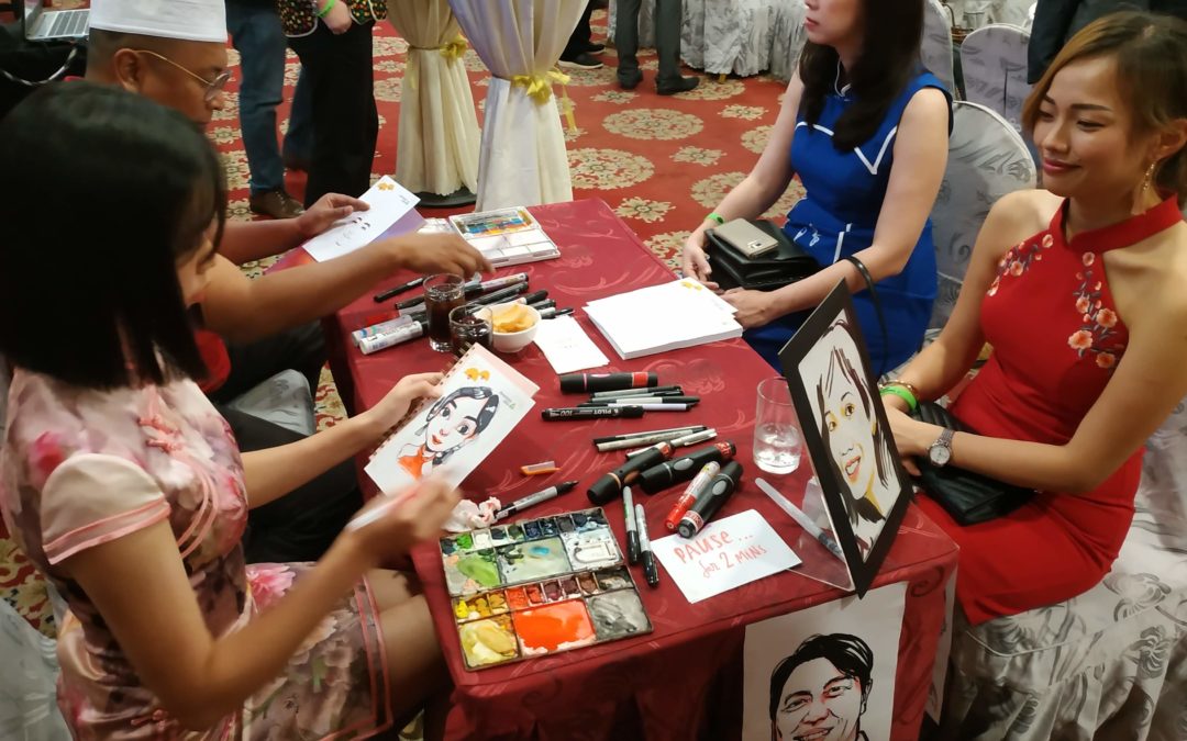 Caricature booth – Data Dimension Chinese New Year annual event